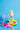 rubber ducky sunscreen spray for kids and children with pool toys in picture