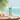 rubber ducky sunscreen on a beach scene showing the label spf 50
